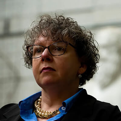 Headshot of Professor Sarah Eaton from University of Calgary