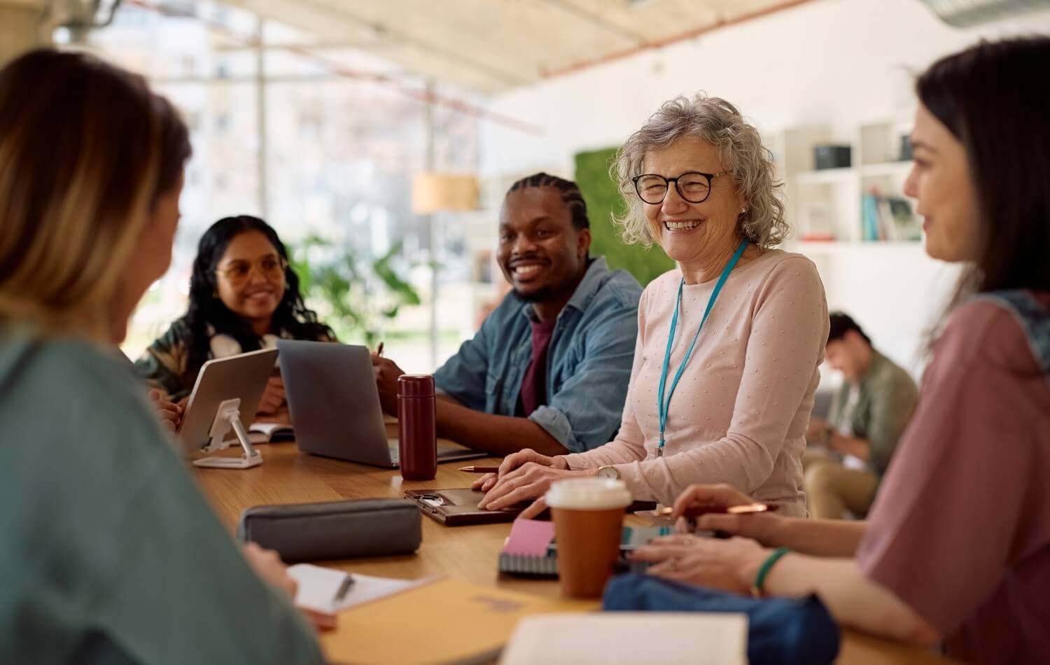 Teacher and students in discussion