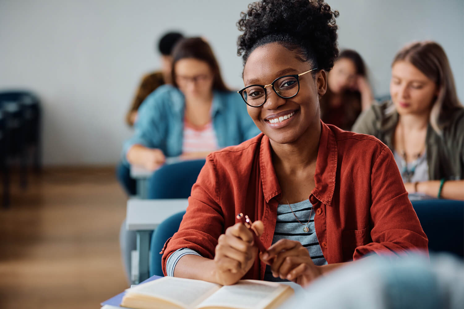 Smiling woman in a lecture