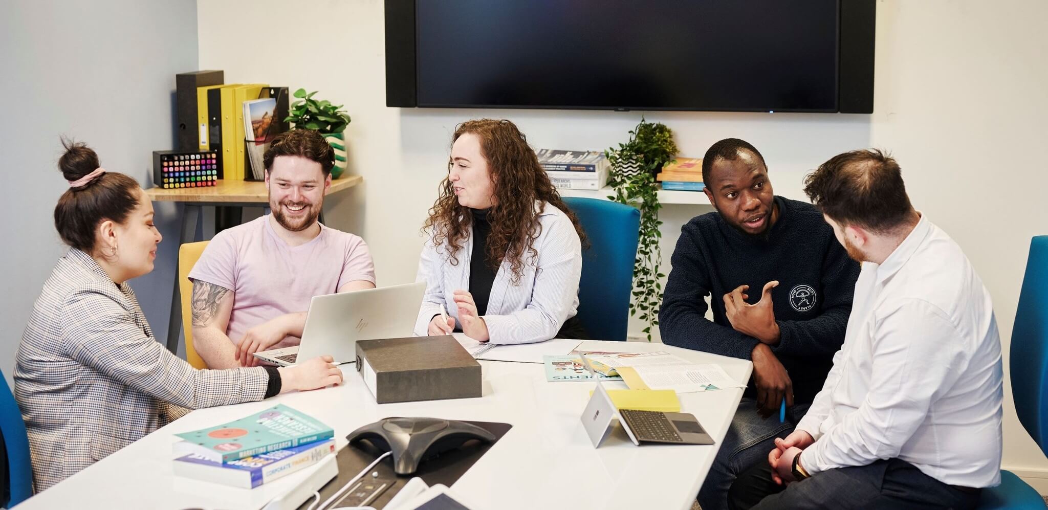 Three students in the Union at Queen Margaret University