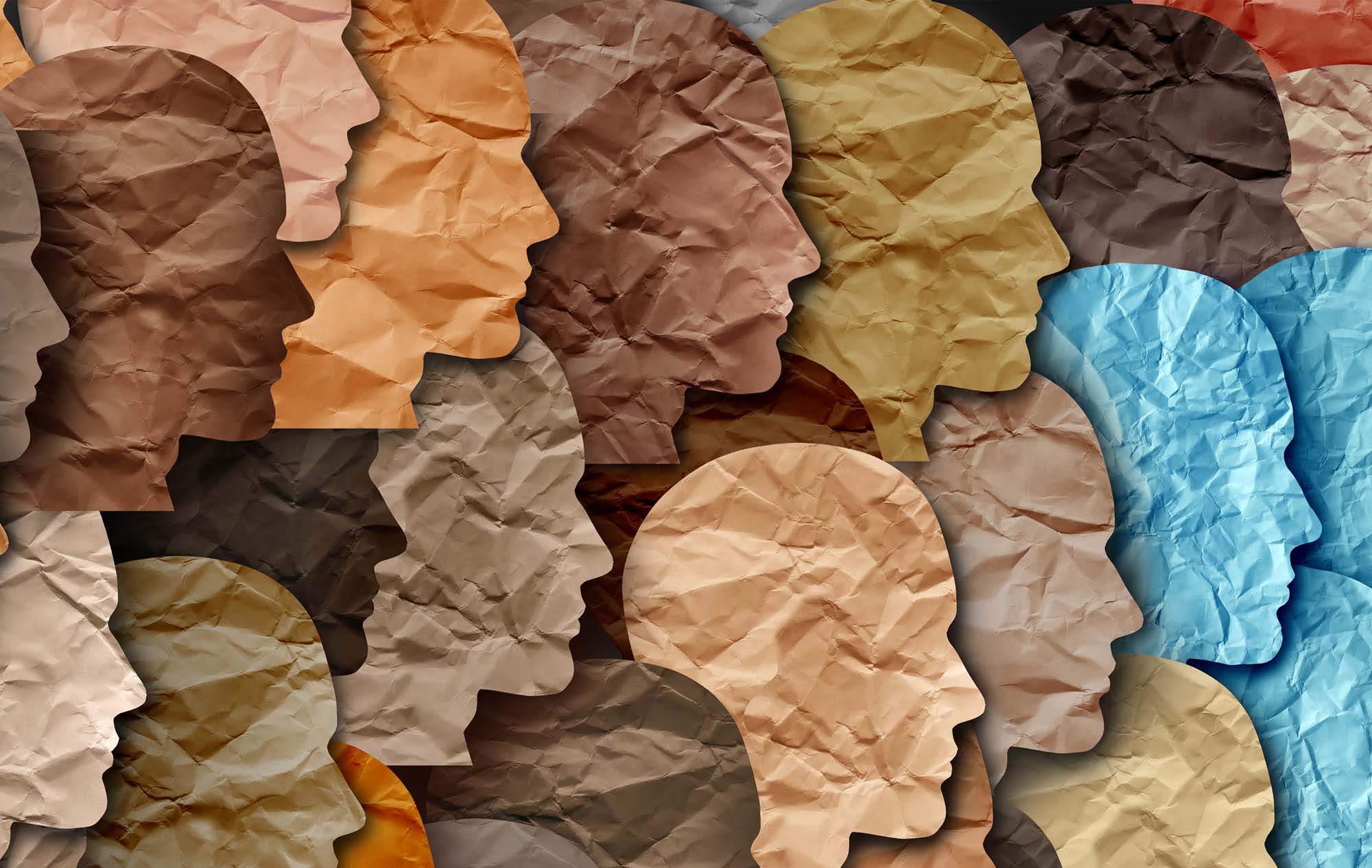 Illustration of different coloured heads looking in the same direction